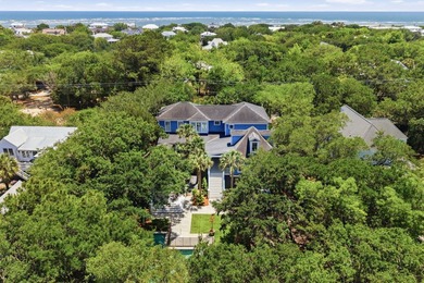 Surrounded by mature live oaks and set on more than half an acre - photo 4