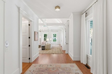 Surrounded by mature live oaks and set on more than half an acre - photo 8