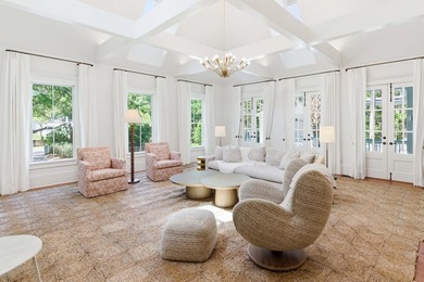 Surrounded by mature live oaks and set on more than half an acre - photo 9