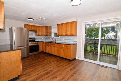 This 2-family in the Yorktown neighborhood of North Kingstown is - photo 3
