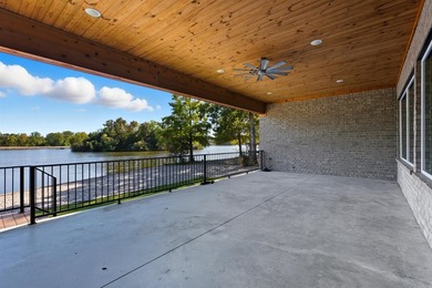Luxury lakefront living awaits in this custom-built 2022 home on - photo 3