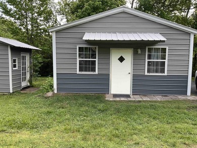 MOTIVATED SELLER !!!! Corner Lot Super cute home with a metal - photo 1