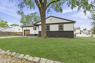 Completely renovated and move-in ready 3-bedroom, 2-bath ranch - photo 2