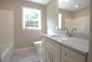 Enjoy the privacy of 1.5 acres in a country setting but offering - photo 20