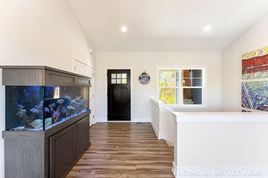 Experience the perfect lakeside newer walkout Ranch Home with - photo 11