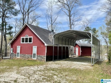 Lakefront home situated on 1.7 acres with 735 feet of year-round - Lake Home For Sale in Wedowee, Alabama