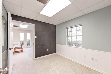 This office building consists of a lobby, reception area