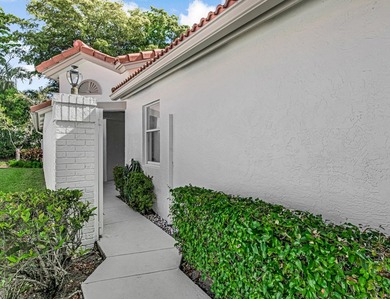 You must see this home in Palm Isles, a premier 55+ community - photo 2