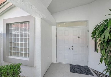 You must see this home in Palm Isles, a premier 55+ community - photo 3