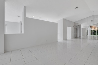 You must see this home in Palm Isles, a premier 55+ community - photo 9