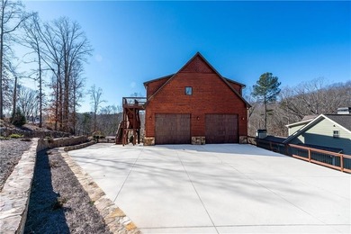 Custom luxury mountain-style home on Lake Lanier, located in the - photo 3