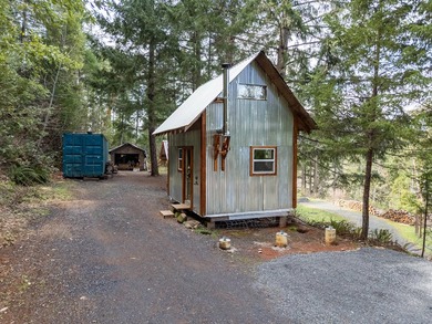 Tucked above the East Fork of the Illinois River, this 10+ acre - photo 2