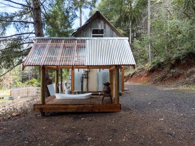Tucked above the East Fork of the Illinois River, this 10+ acre - photo 5