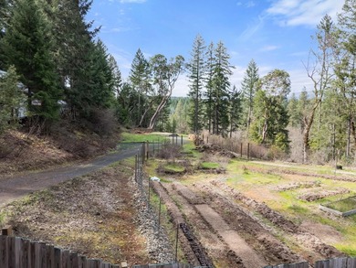 Tucked above the East Fork of the Illinois River, this 10+ acre - photo 8