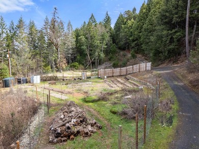 Tucked above the East Fork of the Illinois River, this 10+ acre - photo 10