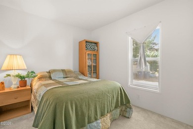This 2021 manufactured home offers an inviting open floor plan - photo 11