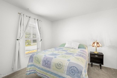 This 2021 manufactured home offers an inviting open floor plan - photo 12