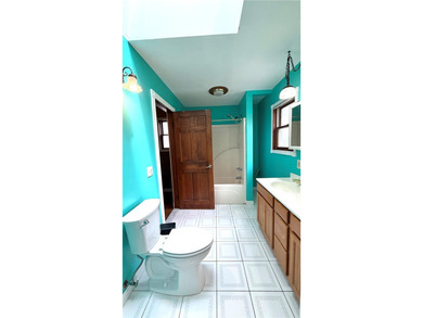 This 5 Bedrooms and 2.5 Bath home w/ in-law setup is located on - photo 13