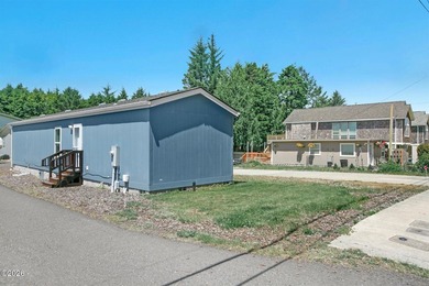This 2021 manufactured home offers an inviting open floor plan - photo 17