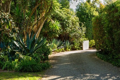 Tucked at the end of a long private drive and hidden behind - photo 26
