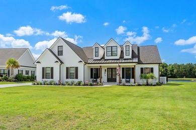 Welcome to 1312 Whooping Crane Drive! Designed for elevated - photo 1