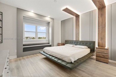 Lakefront living doesn't get more refined than this. Set within - photo 15