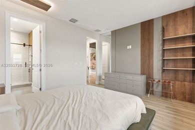 Lakefront living doesn't get more refined than this. Set within - photo 16