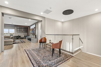 Lakefront living doesn't get more refined than this. Set within - photo 18