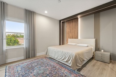 Lakefront living doesn't get more refined than this. Set within - photo 21