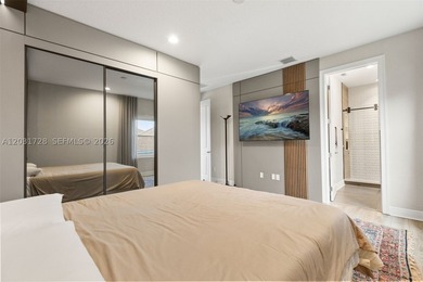 Lakefront living doesn't get more refined than this. Set within - photo 22