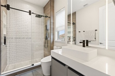 Lakefront living doesn't get more refined than this. Set within - photo 23