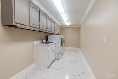 Experience true waterfront living in this stunning 4-bedroom - photo 23