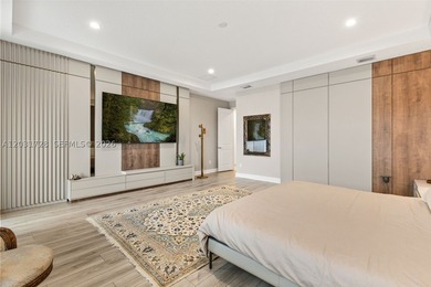 Lakefront living doesn't get more refined than this. Set within - photo 26