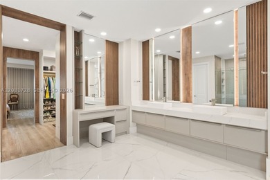 Lakefront living doesn't get more refined than this. Set within - photo 32
