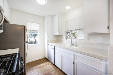 Welcome to this bright and inviting upper-level residence in the - photo 10