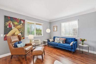 Welcome to this inviting top-floor corner unit in the heart of - photo 7
