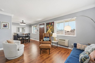 Welcome to this inviting top-floor corner unit in the heart of - photo 8