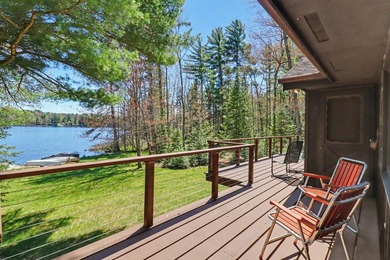 Nestled on nearly 4 private acres along the shores of 54 acre - photo 3