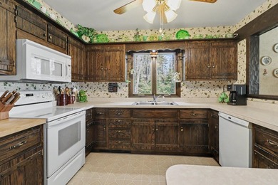 Nestled on nearly 4 private acres along the shores of 54 acre - photo 8