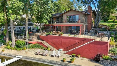 Experience elevated lakefront living on the prestigious Barbee - photo 2