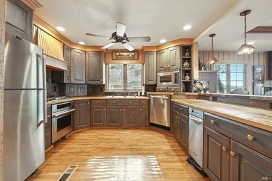 Experience elevated lakefront living on the prestigious Barbee - photo 6