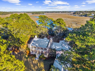 Set on nearly nine beautifully maintained acres along the - photo 3