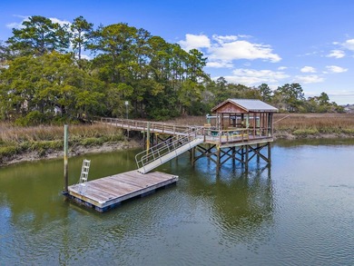 Set on nearly nine beautifully maintained acres along the - photo 5