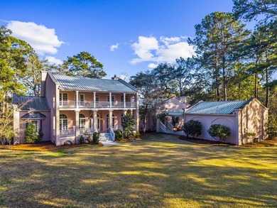 Set on nearly nine beautifully maintained acres along the - photo 7