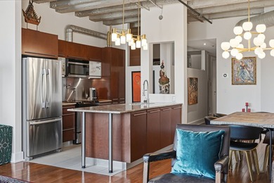 Bienvenue dans ce condo lumineux a aire ouverte, situe au coeur - photo 13