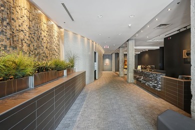 Bienvenue dans ce condo lumineux a aire ouverte, situe au coeur - photo 25