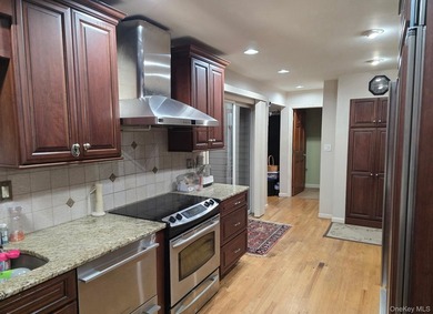This is a Lovely U-Shaped Sprawling Ranch on over an acre of - photo 6