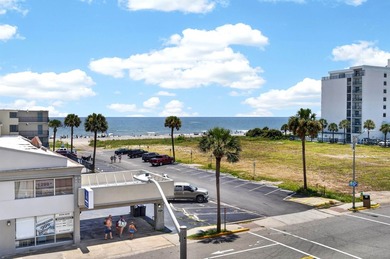 Ocean Views, End-Unit, and Opportunity! This end-unit condo at - photo 2
