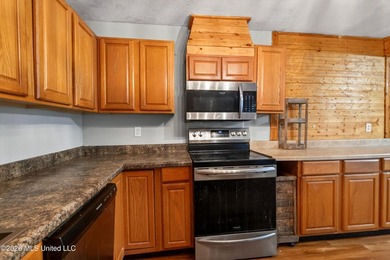 Situated on approximately 3.5 private acres in Long Beach, this - photo 23