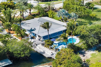 Welcome to this spacious canal-front retreat set on an oversized - photo 3